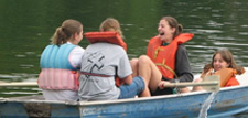 Campers enjoying a boat ride